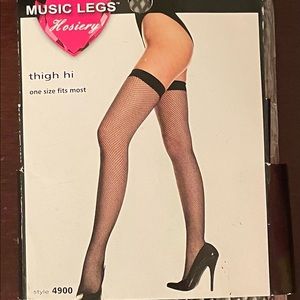 Fishnet black thigh highs pantyhose.